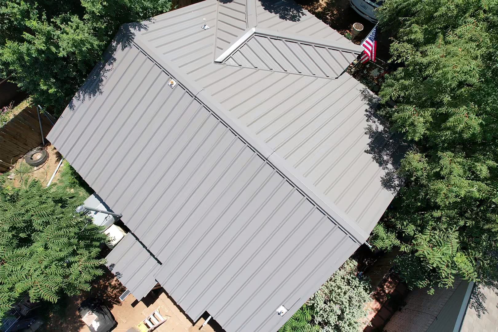 Gallery photos for Old Shingles Out, Standing Seam Metal Roof In: Image #1