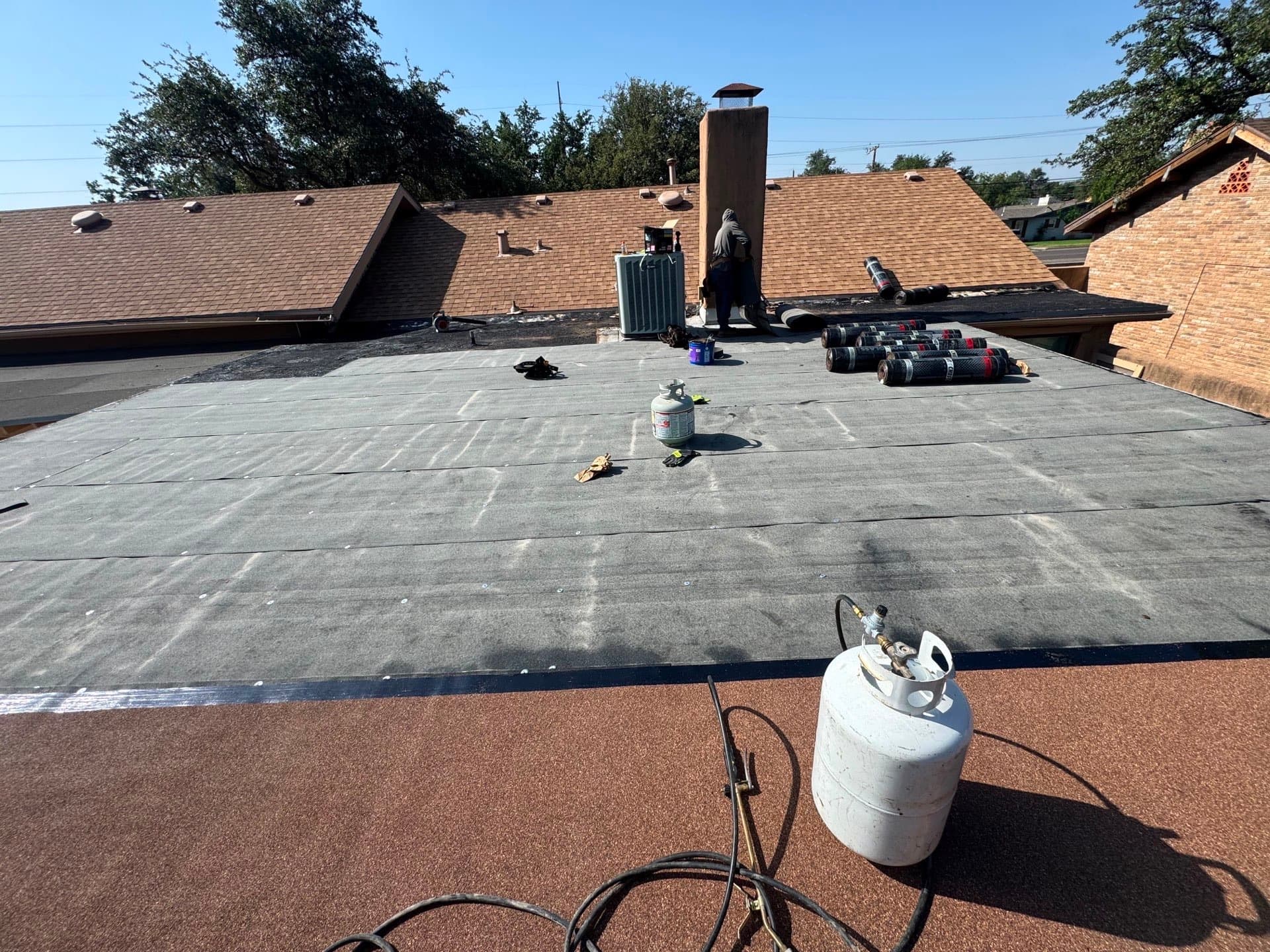 Torch Down Flat Roof Replacement and Gutter Repair in Midland TX image