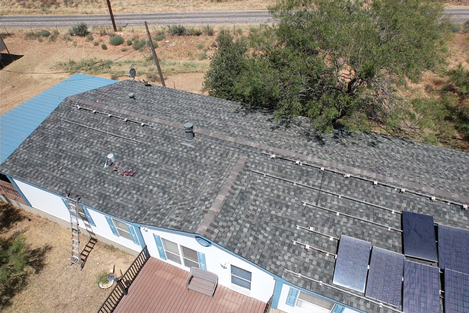 Shingle Roof Replacement and Solar Detach Reset in Big Spring TX image